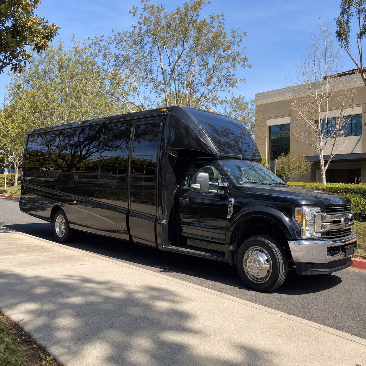 Friends laughing during a party bus celebration in Lakeland