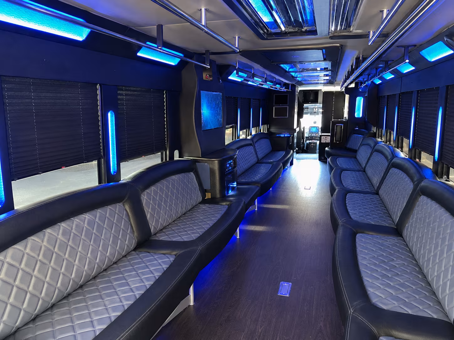 Wedding guests seated inside a party bus serving Lakeland